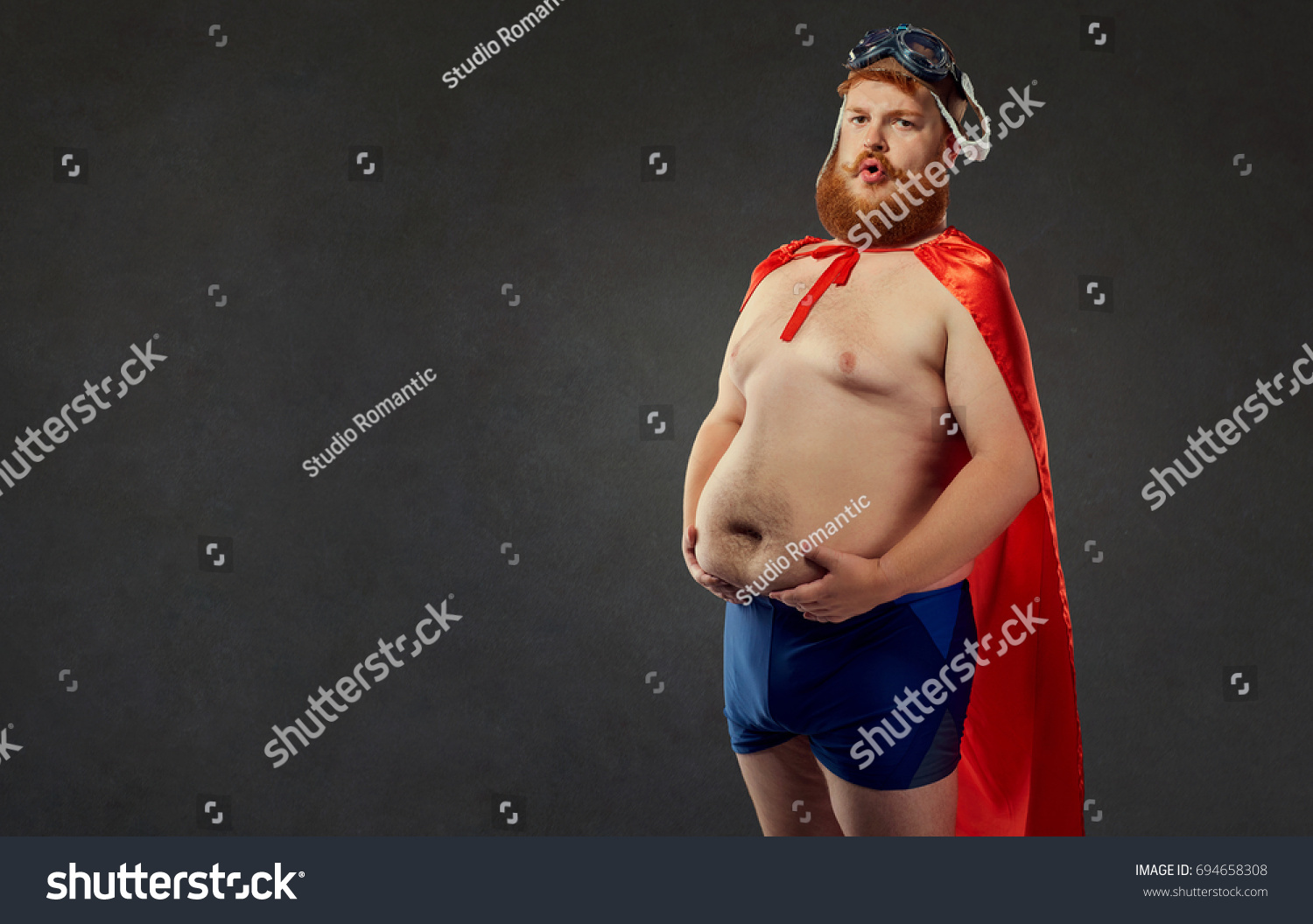 fat man in swimming shorts