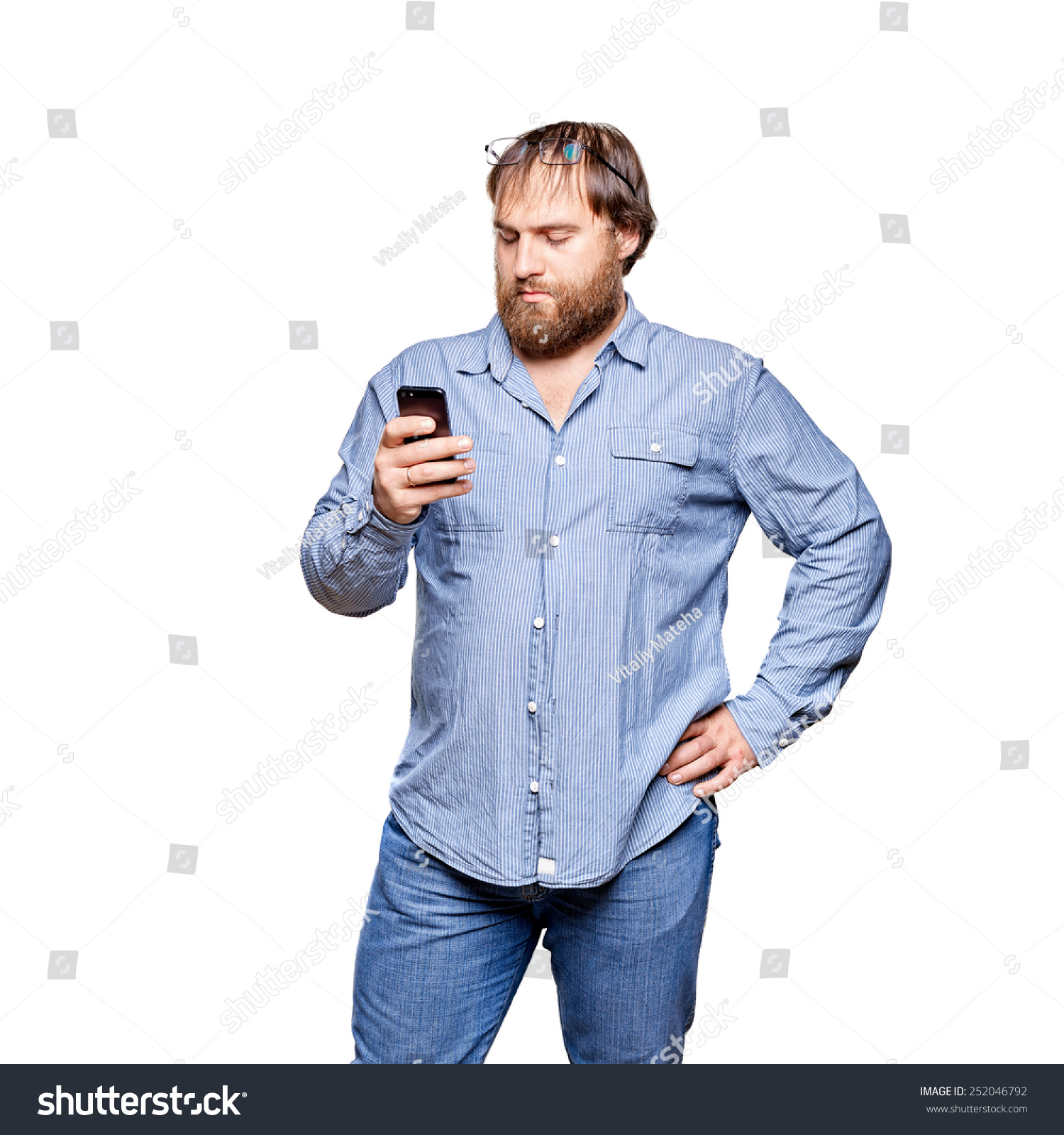 man wearing jeans and shirt