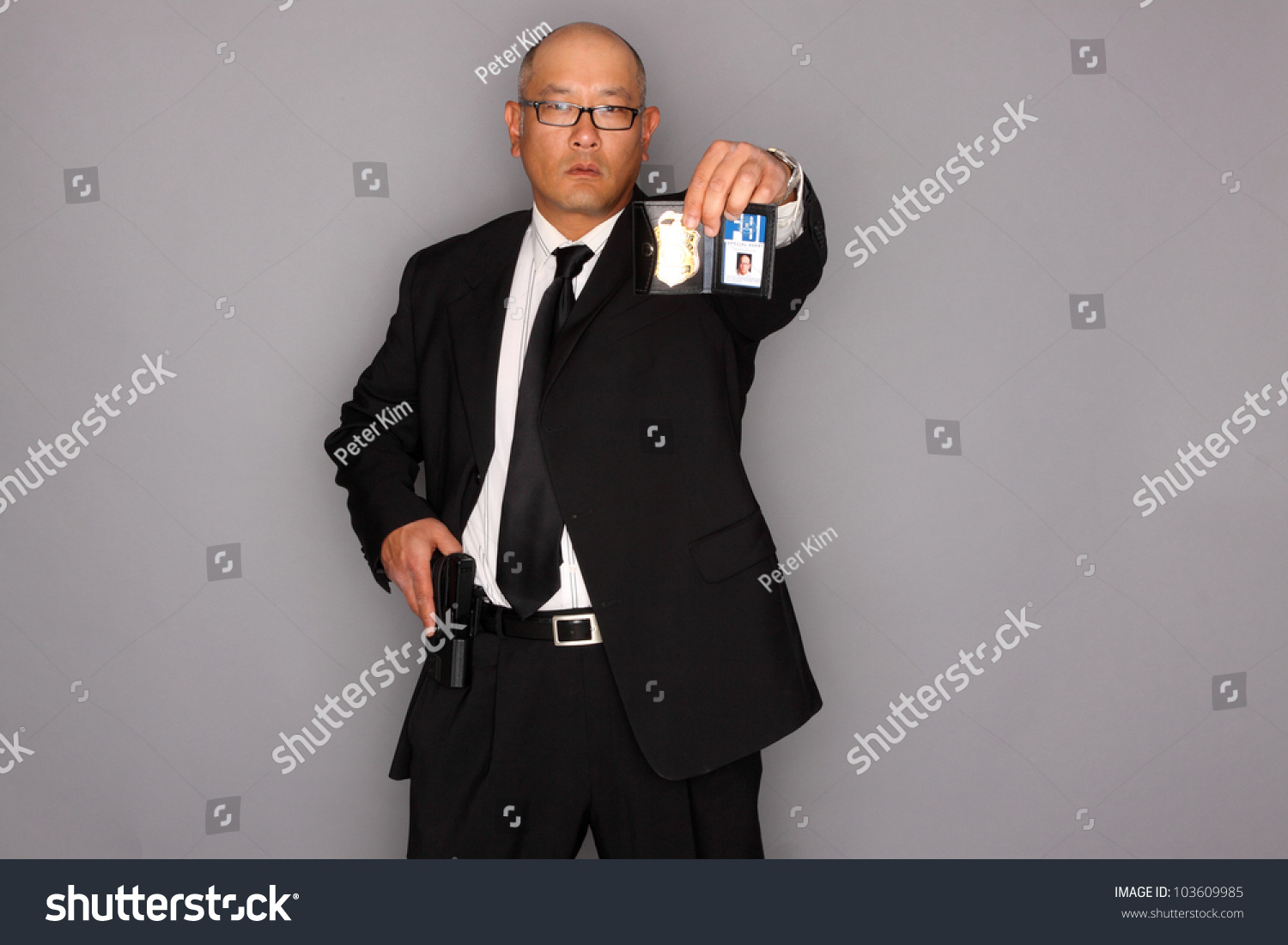 Fbi Agent With Gun And Holding A Badge. Stock Photo 103609985 ...