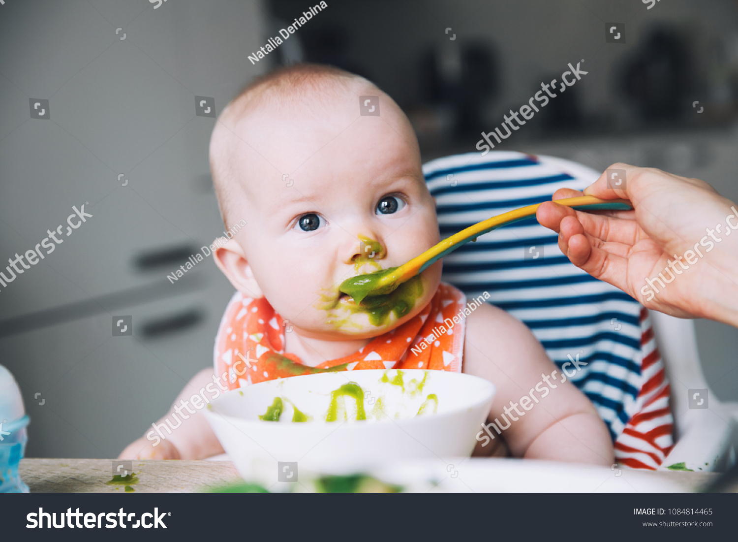 baby's first spoon feeding