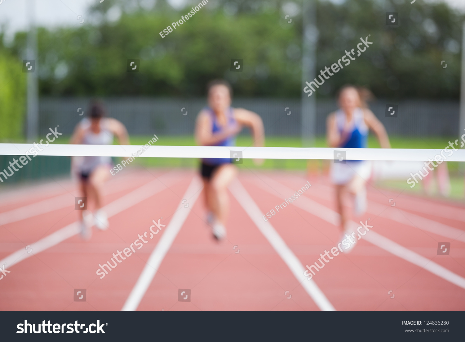 Portrait Of Female Athlete In Ready To Run Position Stock 