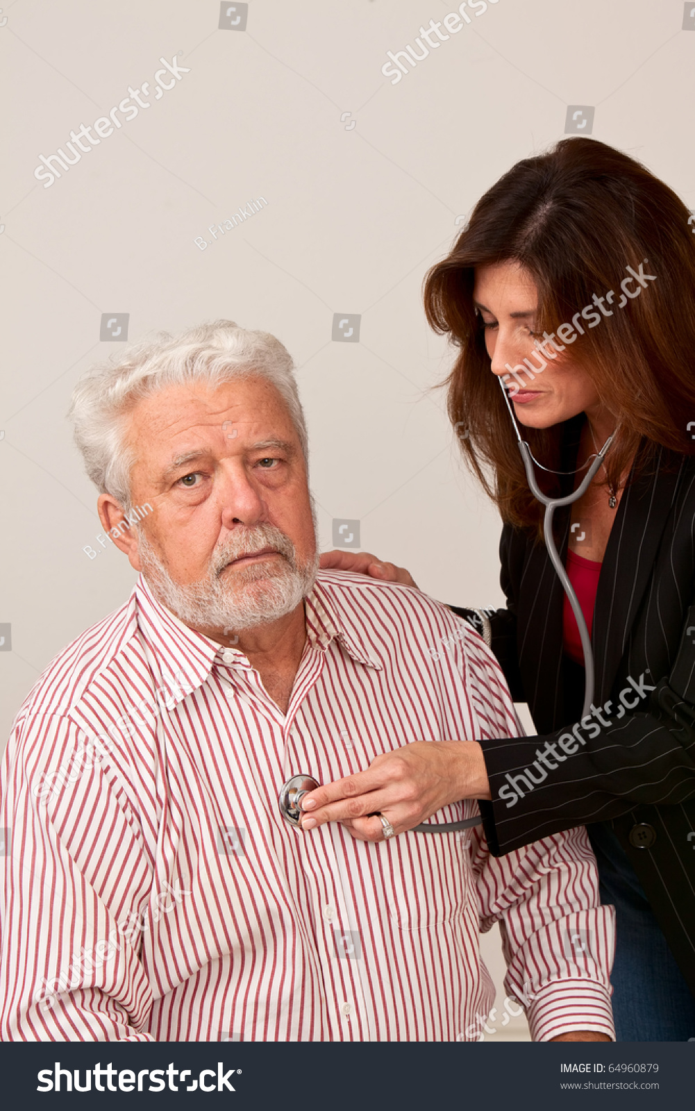 Female Doctor Give Senior Male Physical Stock Photo 64960879 - Shutterstock-6006