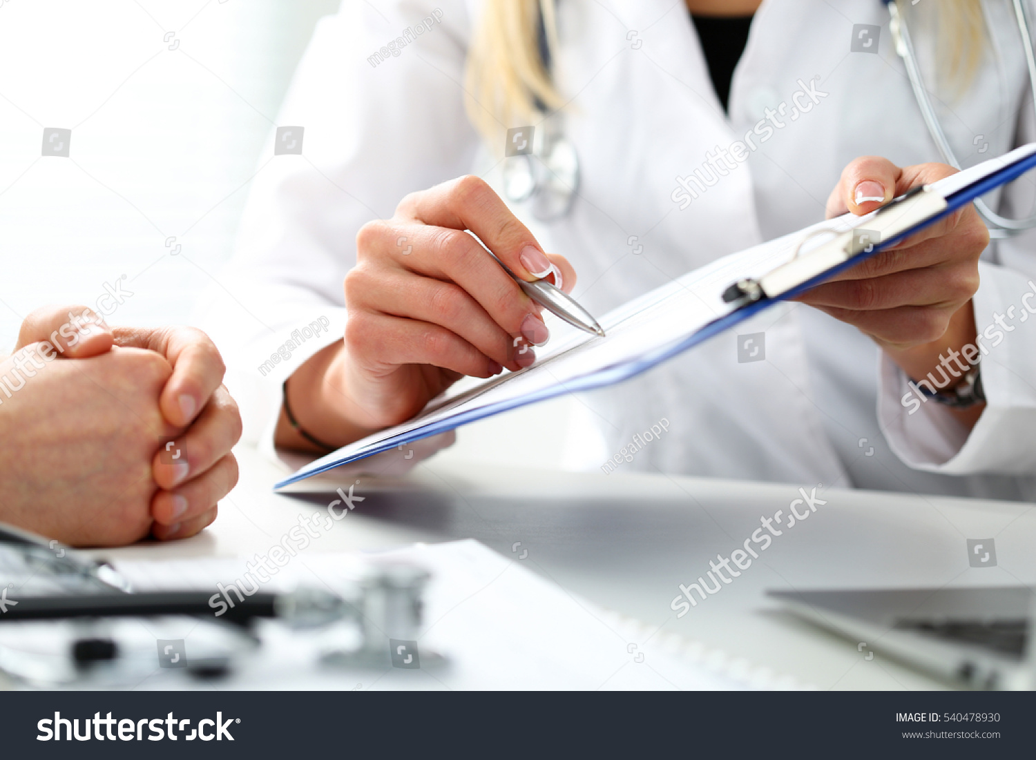 Female Doctor Hand Hold Silver Pen Stock Photo 540478930 - Shutterstock-8671