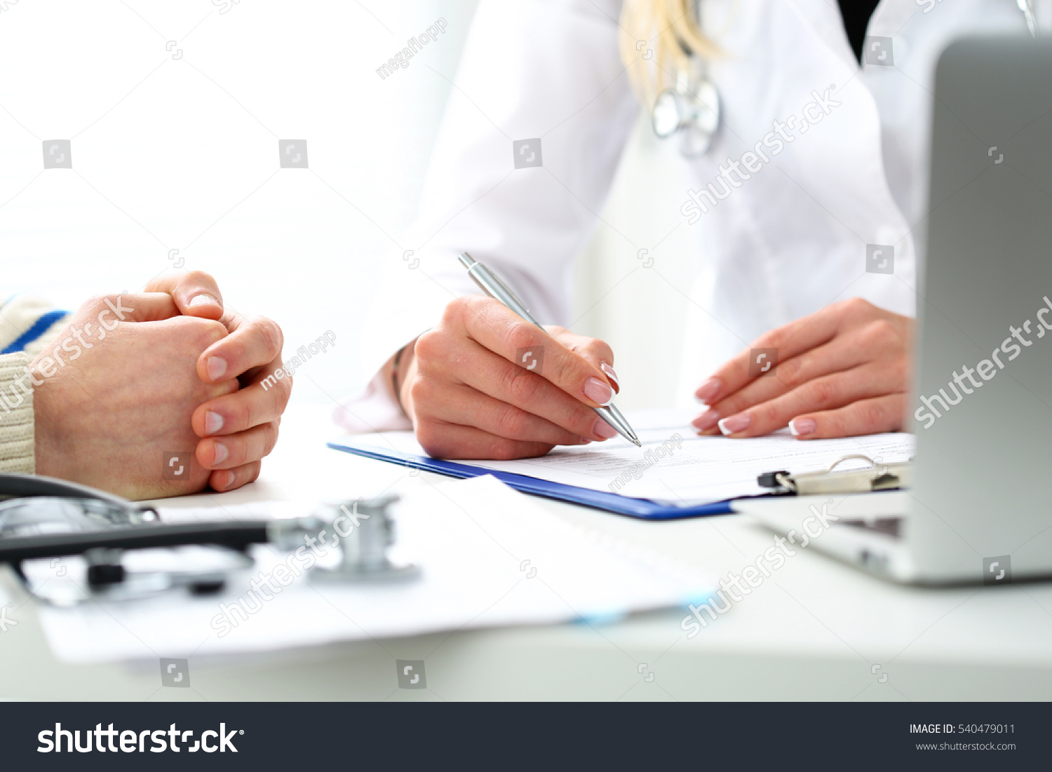 Female Doctor Hand Hold Silver Pen Stock Photo 540479011 - Shutterstock-8248