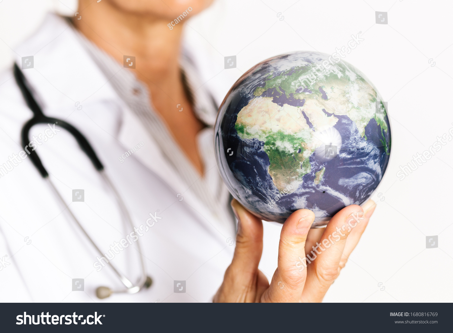 1,845 Doctor holding globe Images, Stock Photos & Vectors | Shutterstock