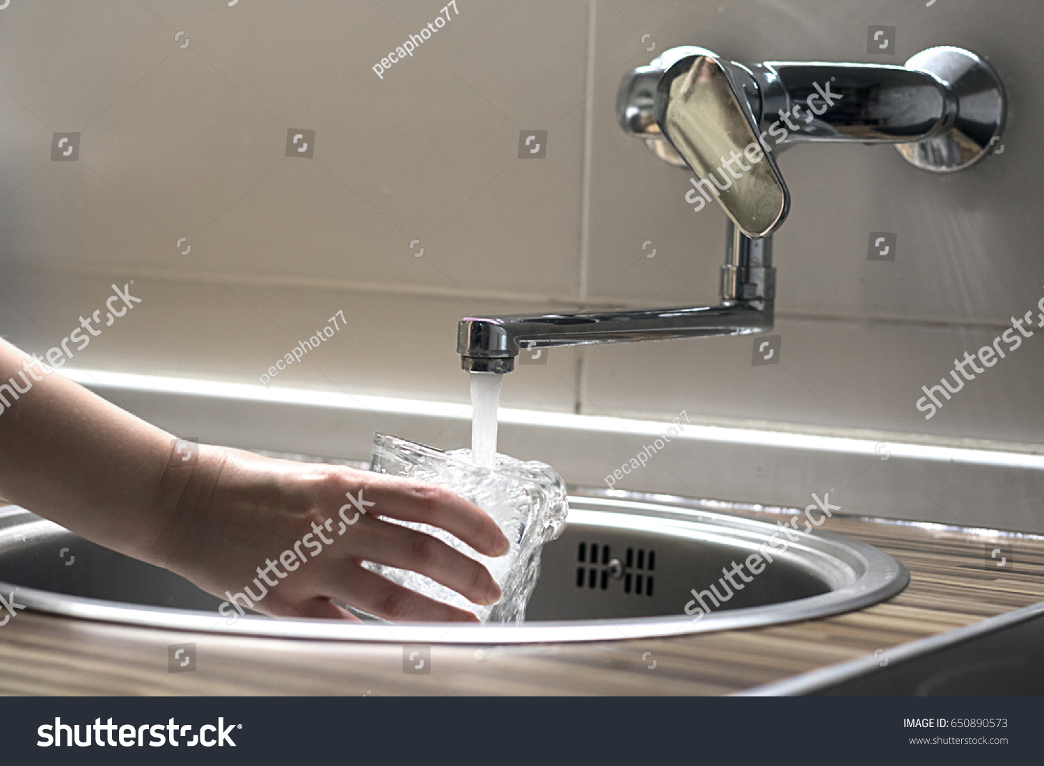 Female Hands Pouring Water Glass Cup Stock Photo 650890573