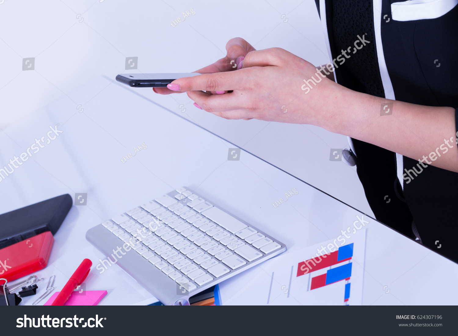Female Office Workers Using Mobile Phone Stock Photo Edit Now