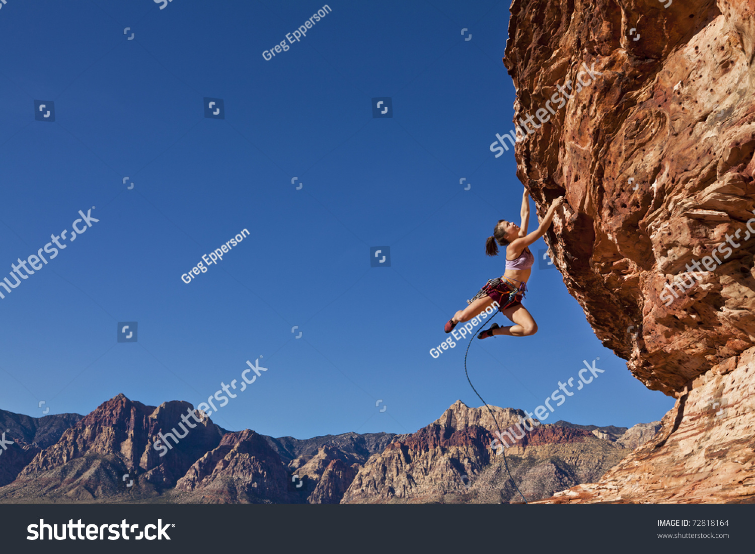 Female Rock Climber Climbs On Rocky Stock Photo (Edit Now 