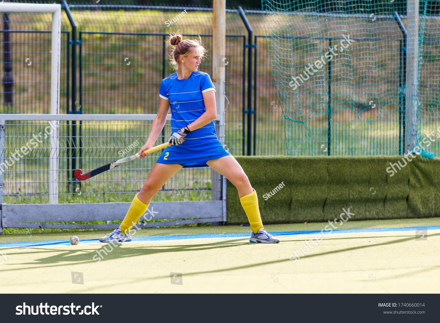 Field Hockey Player Performing Corner Penalty Stock Photo 1740660014   Stock Photo Field Hockey Player Performing Corner Penalty Shot 1740660014 