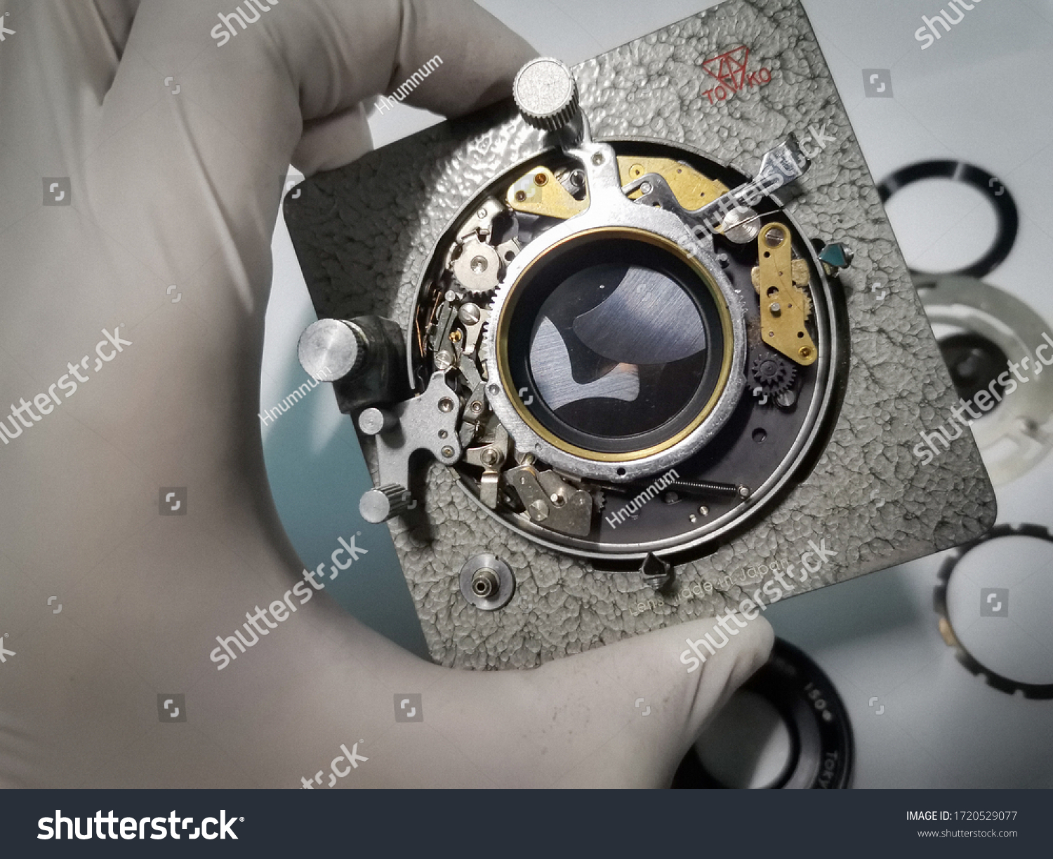 stock-photo-film-camera-camera-vintage-lens-lens-vintage-repair-1720529077.jpg