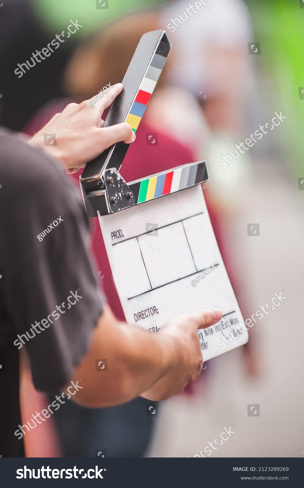 Filming On Location Man Holding Clapperboard Stock Photo 2123289269 ...