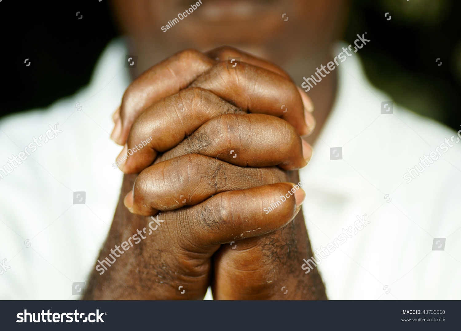 Fingers Of Afro Man Clasped In Front Of His Body Stock Photo 43733560 ...