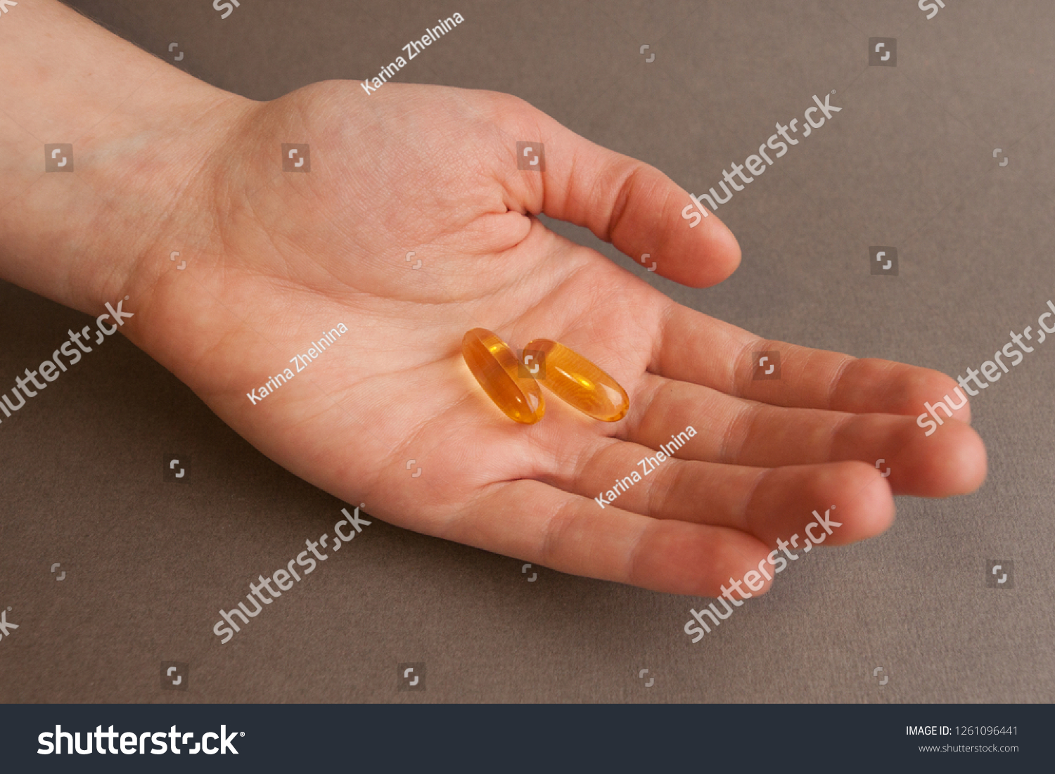 Fish Oil Capsules On Palm Closeup Stock Photo Edit Now 1261096441