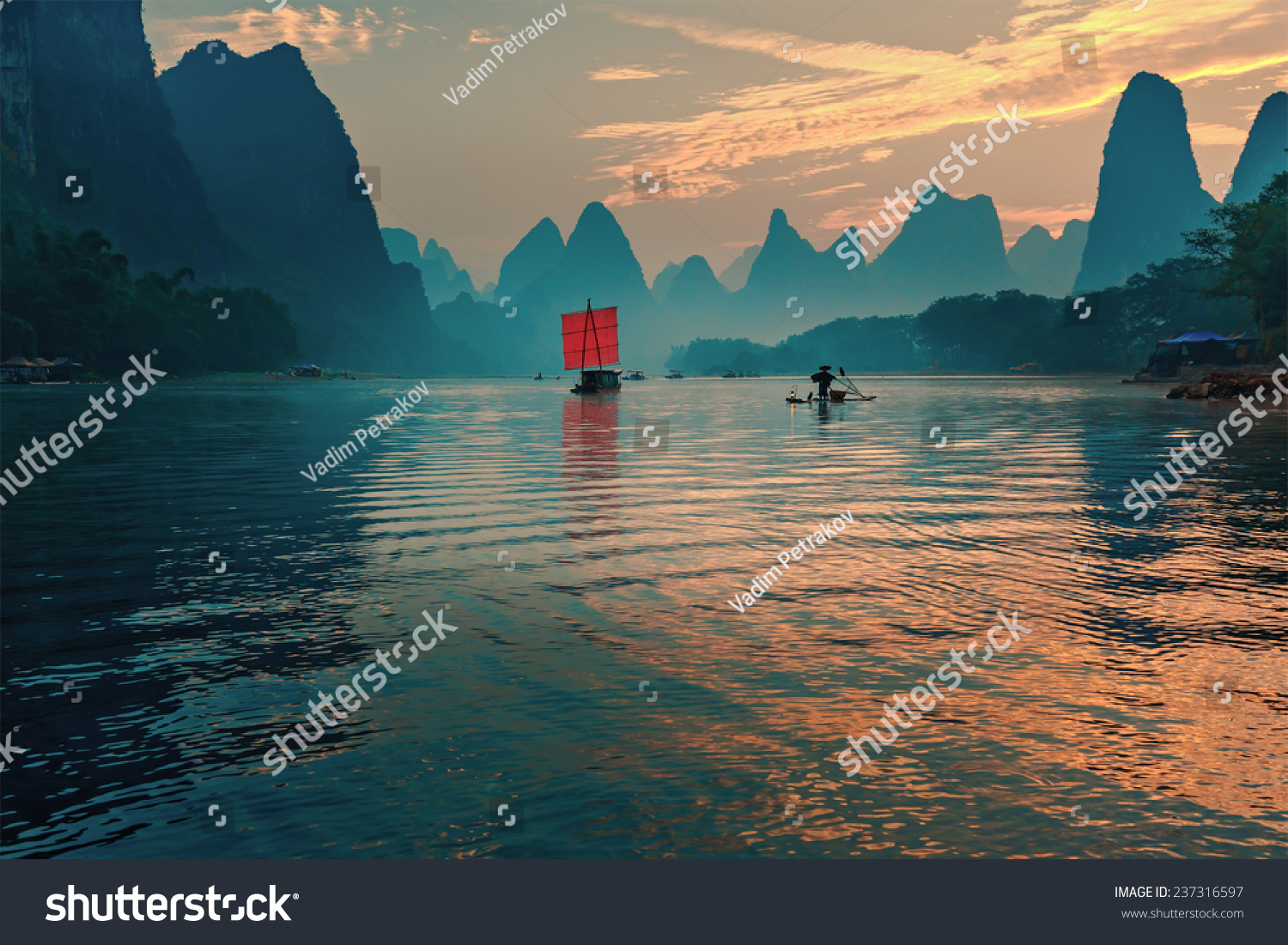 Fisherman Stands On Traditional Bamboo Boats At Sunrise (Boat With A ...