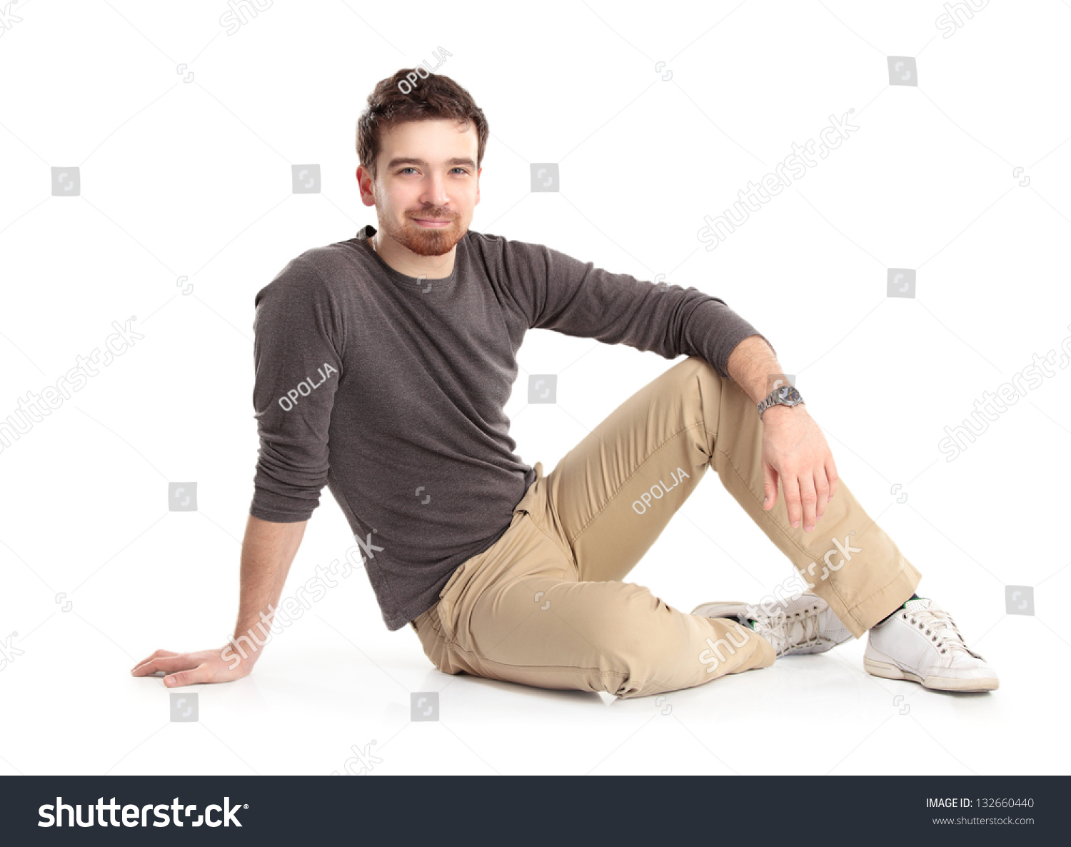 Flirtatious Man Sitting On Floor Stock Photo 132660440 - Shutterstock