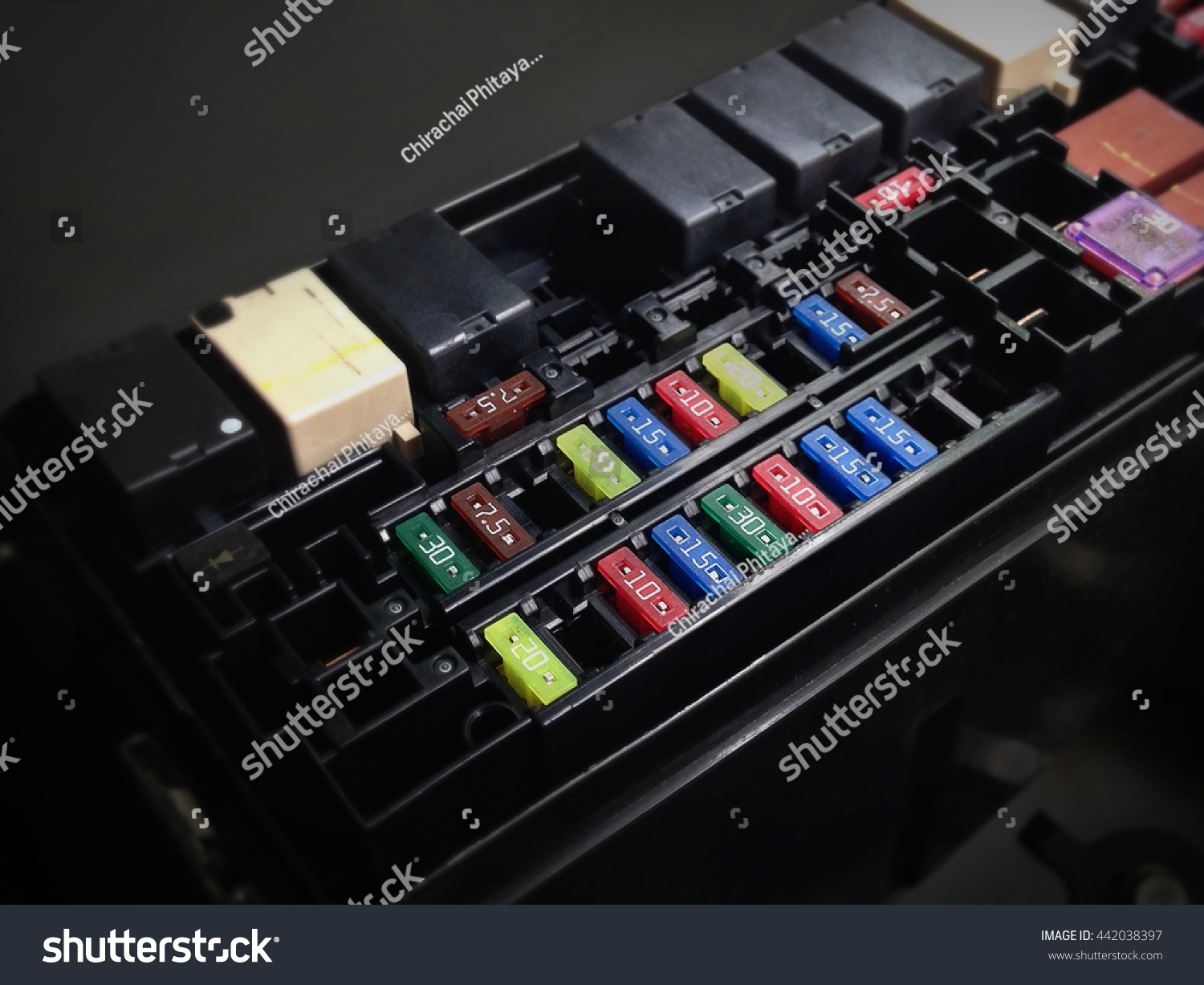 Focus of Car Fuse box in low key light., Control engine lighting of car