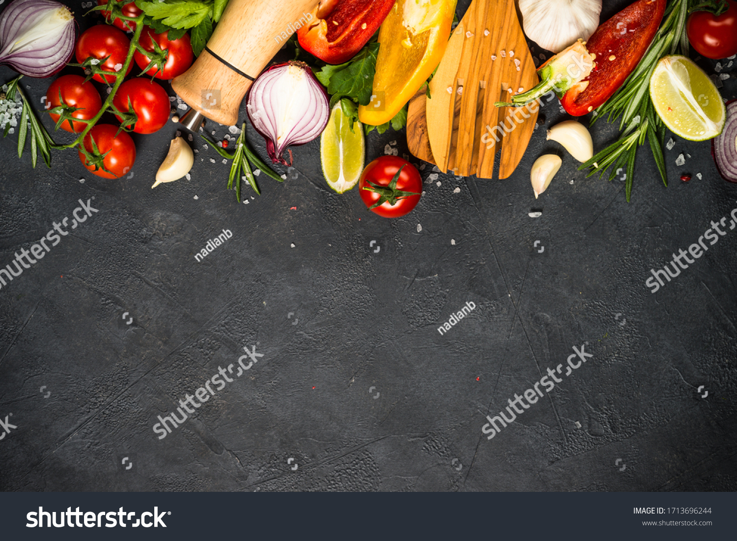 Food Cooking Background On Black Stone Stock Photo 1713696244 ...