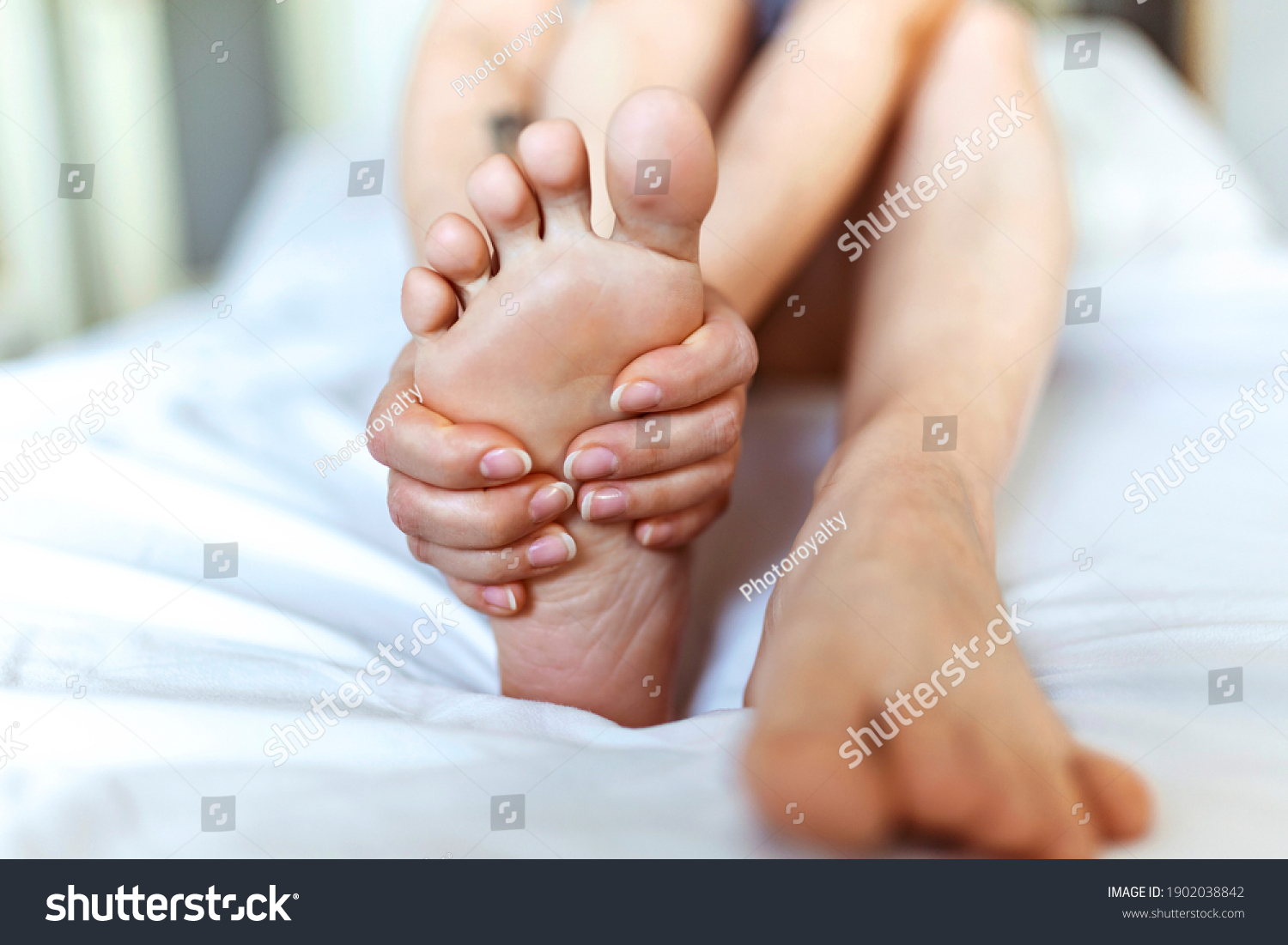 Foot Pain Woman Sitting On Bed Stock Photo 1902038842 Shutterstock