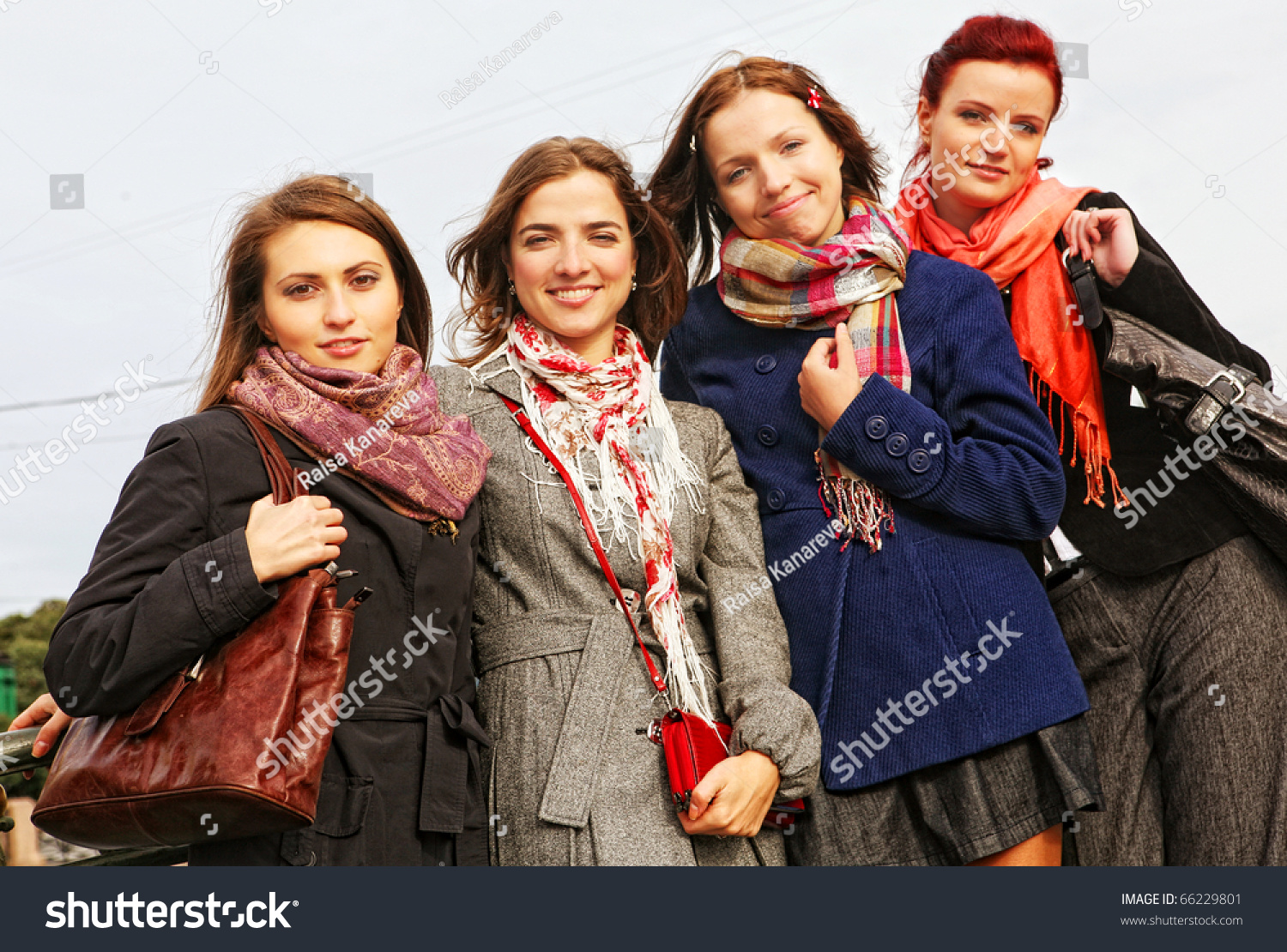 Four Women Walking Along The Street Together Stock Photo 66229801 ...