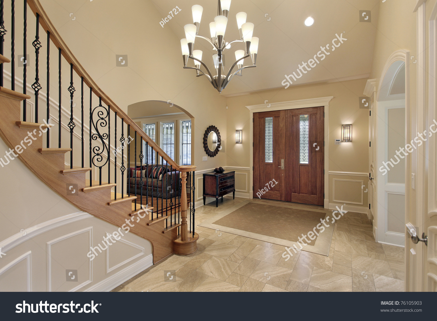 Foyer luxury home curved staircase stock photo 76105903 shutterstock