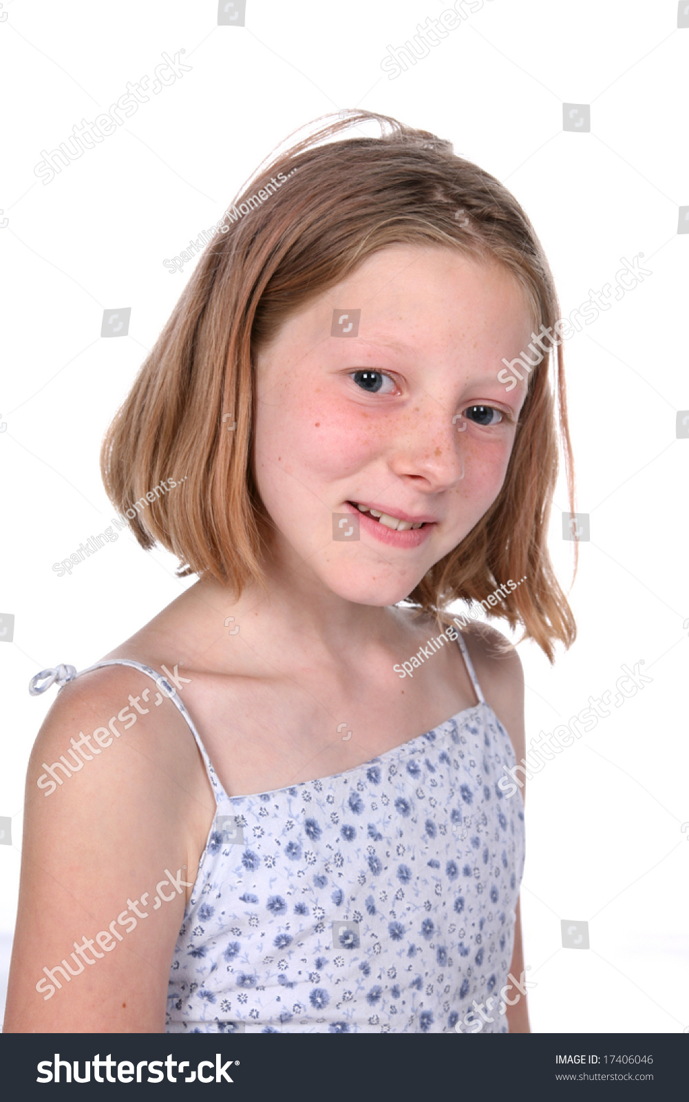 Freckled Little Girl With Short Straight Hair Smiling Stock Photo ...