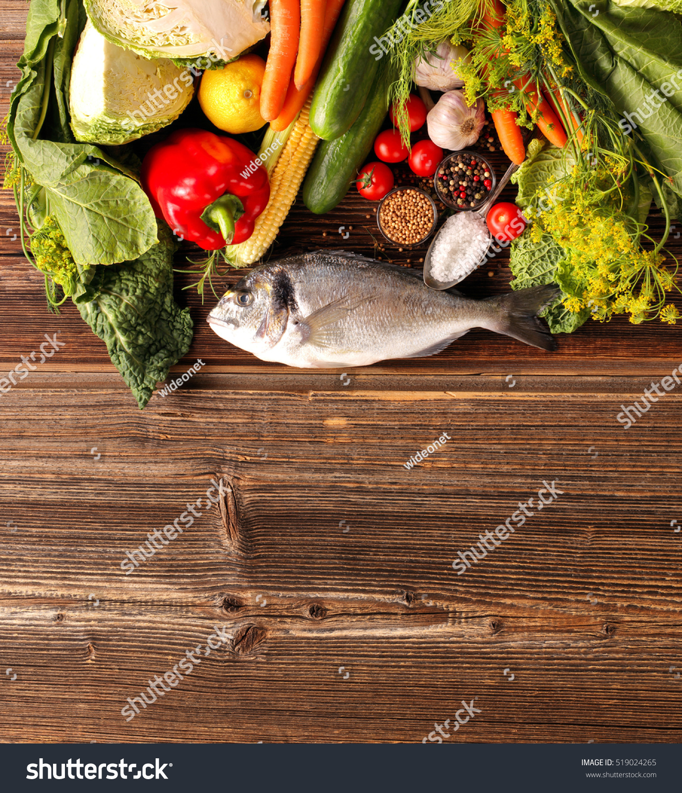 Fresh Raw Fish And Food Ingredients On Wooden Background With Empty ...