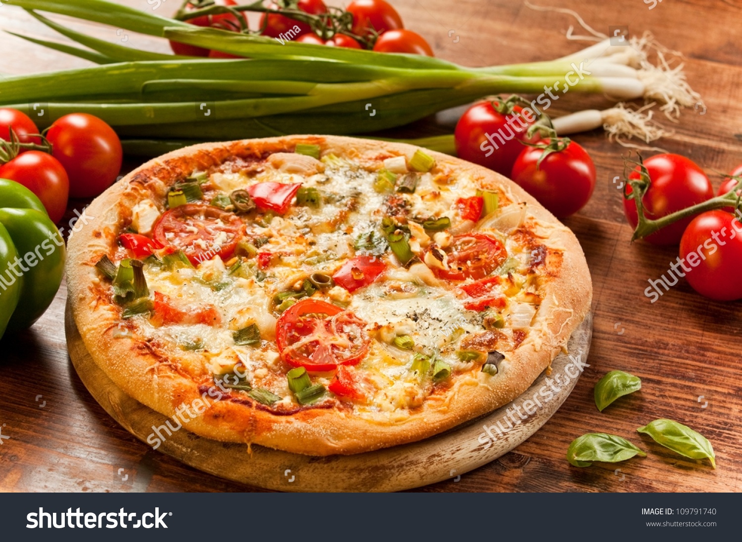 Freshly Prepared Pizza, Baked With Herbs And Vegetables Stock Photo ...