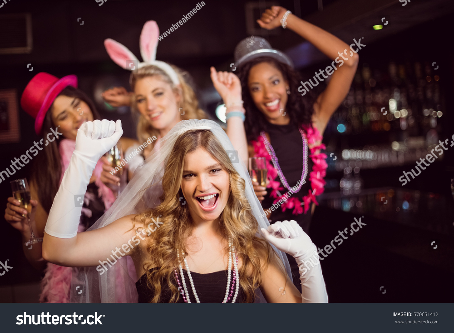 Friends Celebrating In A Nightclub Friends Celebrating Bachelorette Nightclub Stock