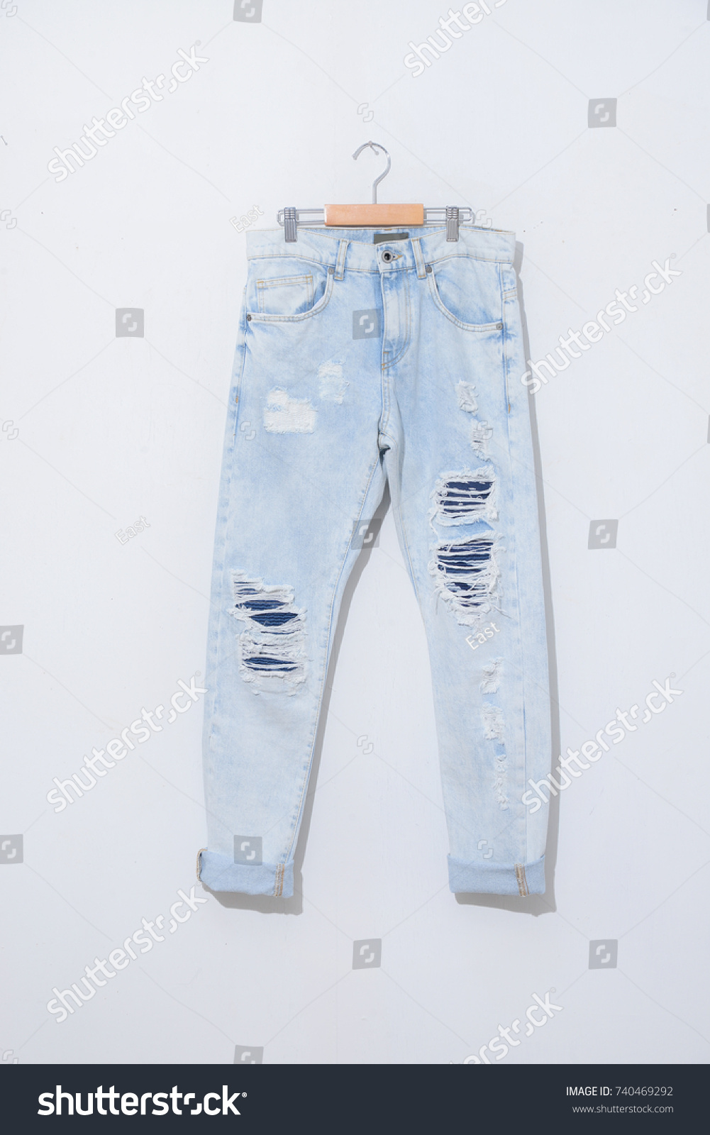 light blue torn jeans