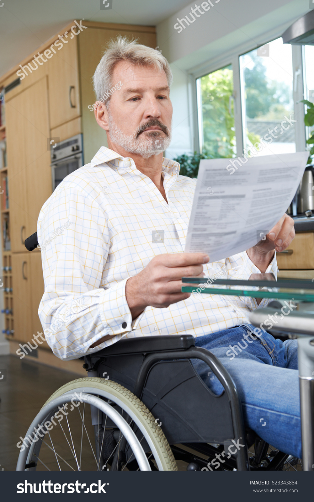 Frustrated Man Wheelchair Home Reading Letter Stock Photo 623343884 ...