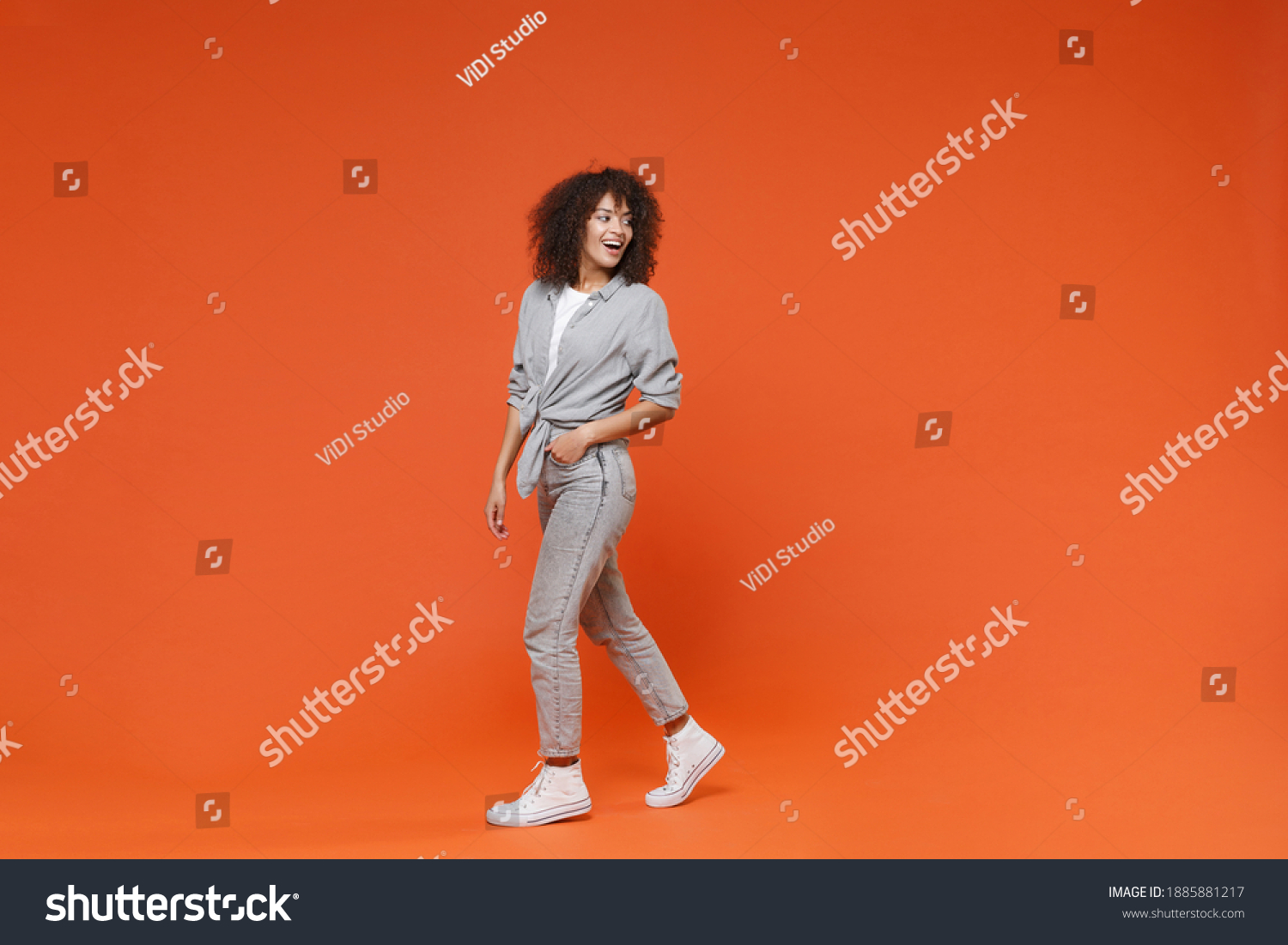 full-body-length-side-view-cheerful-stock-photo-1885881217-shutterstock