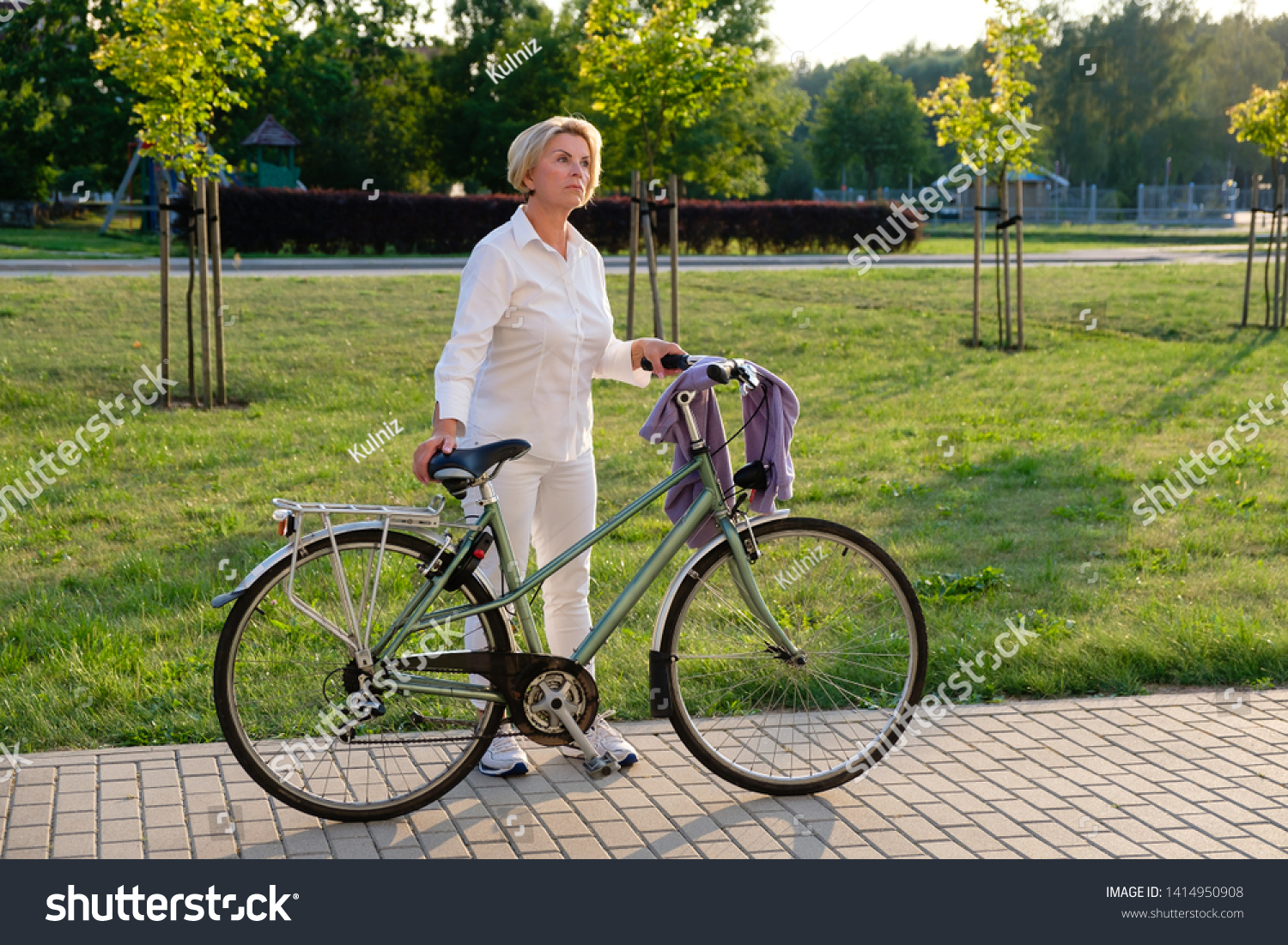 old lady on bike