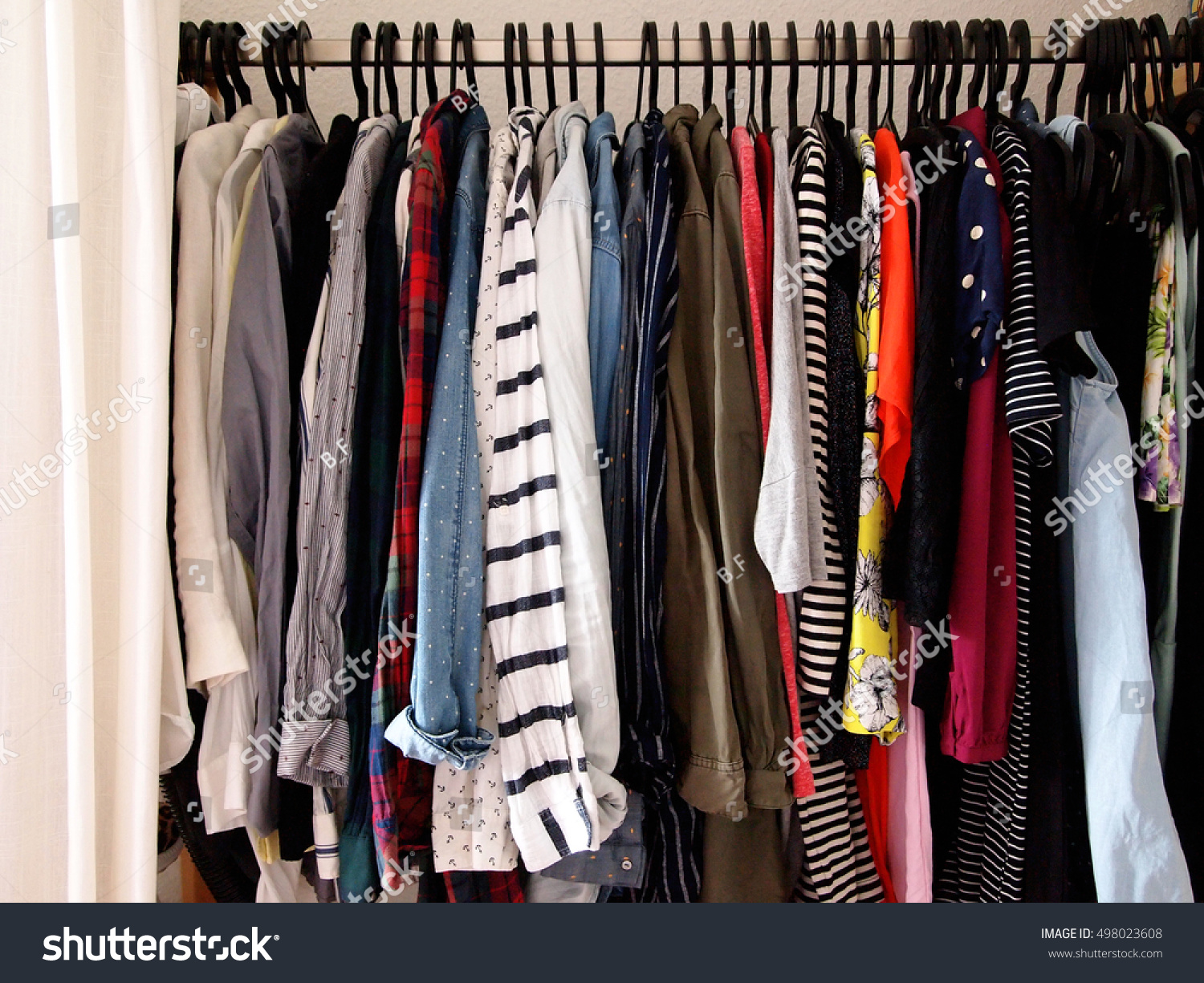 Full Clothes Rail Womans Closet Stock Photo (Edit Now) 498023608