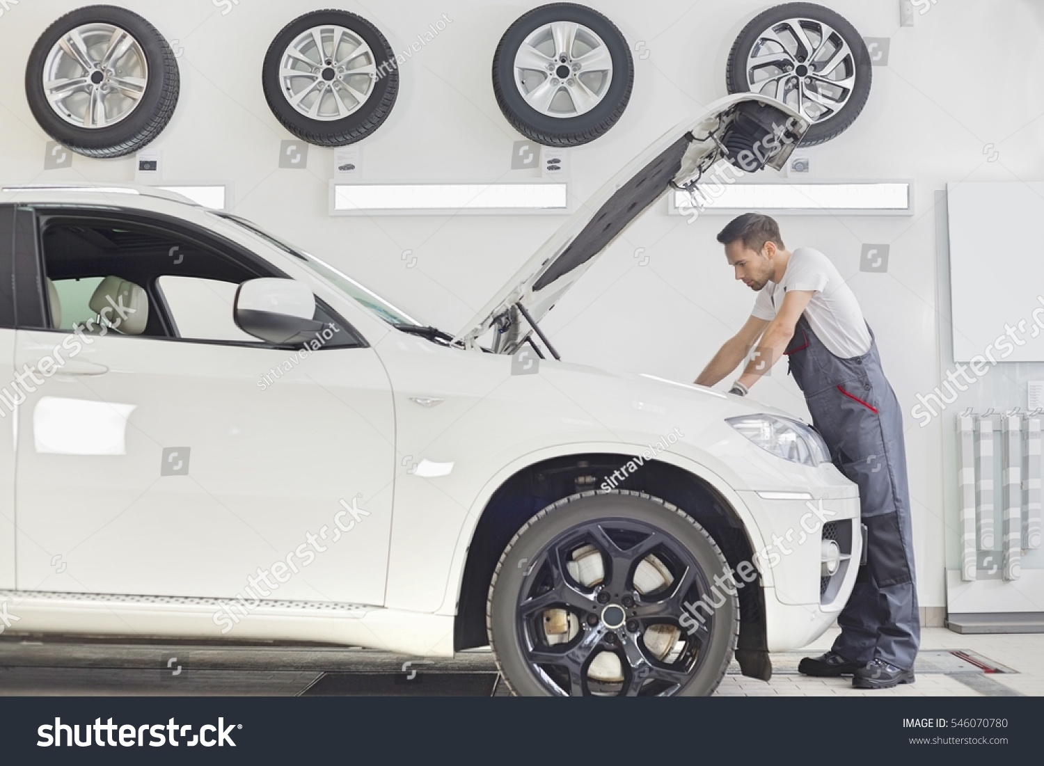  Light Gray Classic  Template Design Featuring Full Length Side View of Male Mechanic