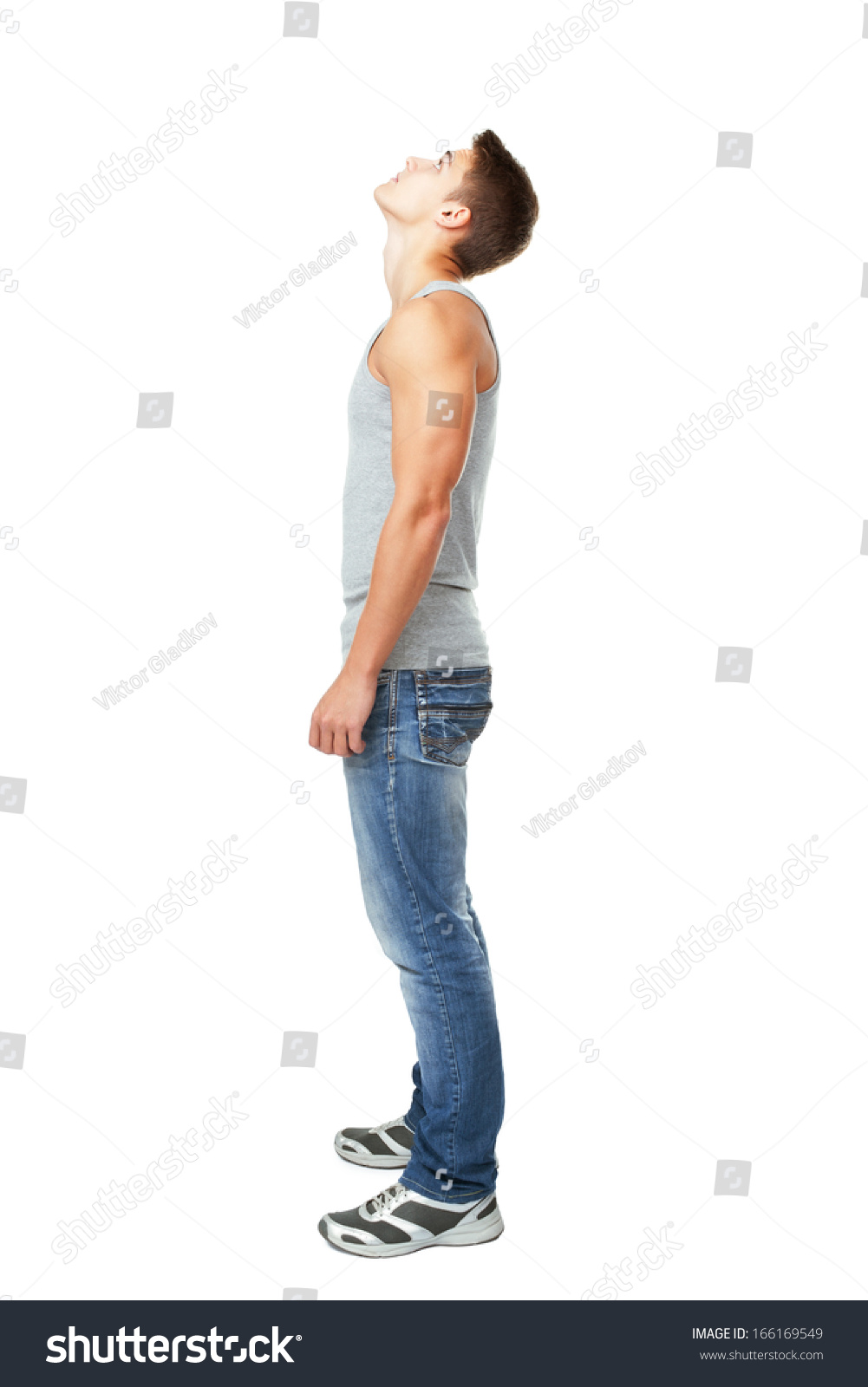 Full Length Side View Portrait Of Young Man Looking Up Isolated On ...