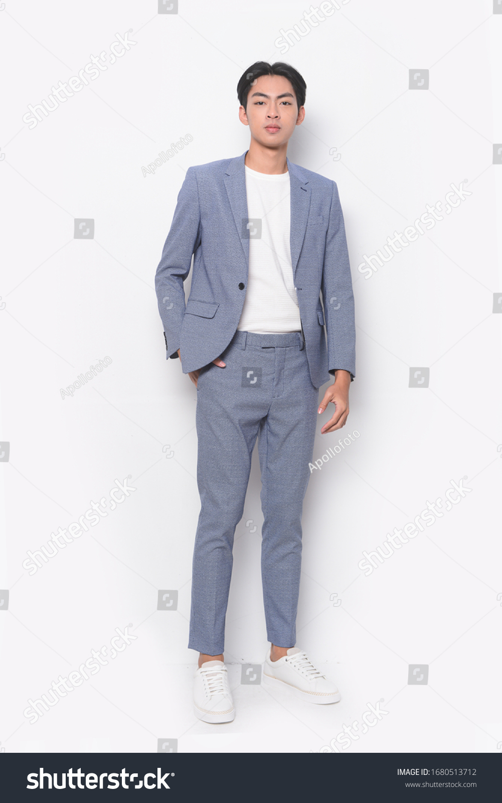 gray suit with white shoes