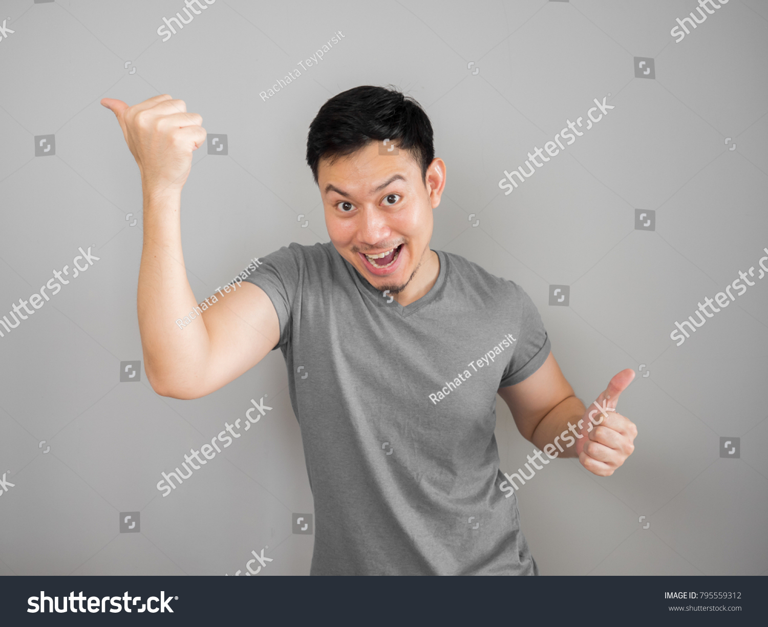 Funny Asian Man Crazy Dancing Pose Stock Photo (Edit Now) 795559312