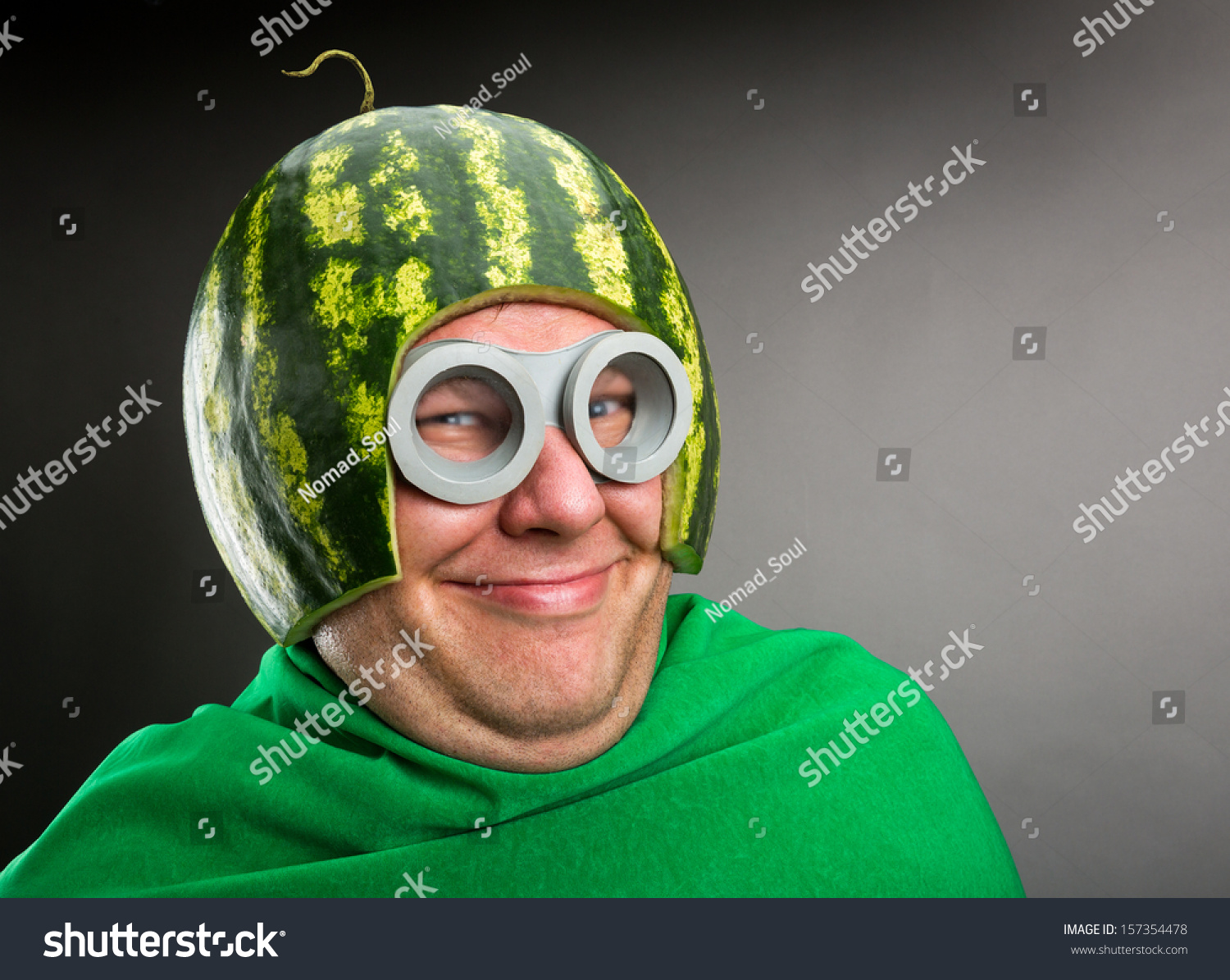 stock-photo-funny-man-with-watermelon-helmet-and-googles-looks-like-a-parasitic-caterpillar-157354478.jpg