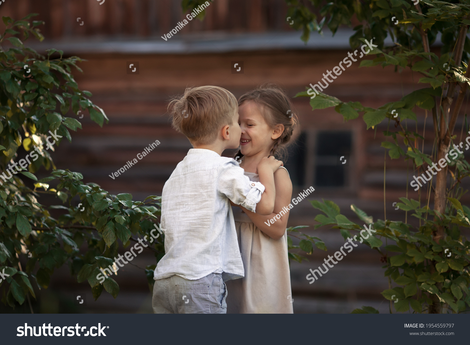 Funny Twins Boy Girl Hugs Kissing Stock Photo (Edit Now) 1954559797