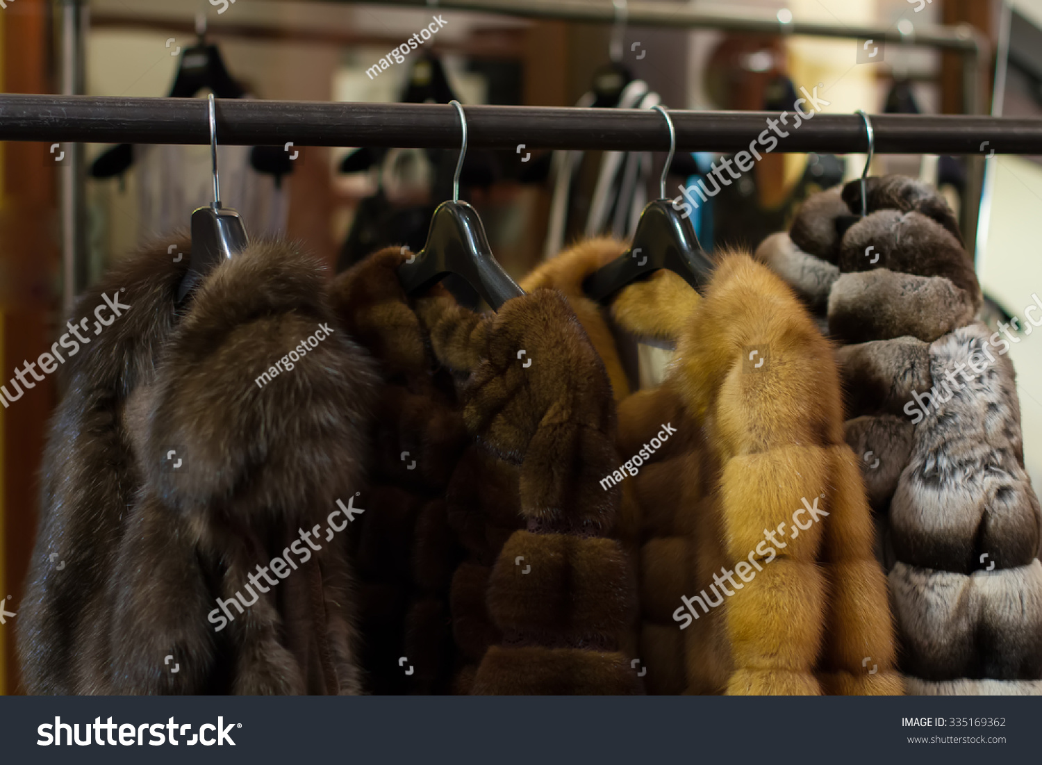 Fur Coats Hanging On Hangers Boutique Stock Photo 335169362 - Shutterstock
