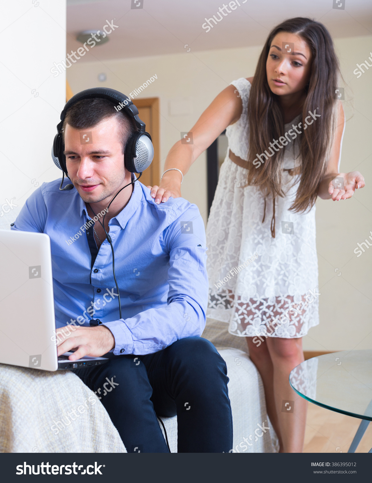 Furious Young Wife Catching Husband Watching Stock Photo (Edit Now.