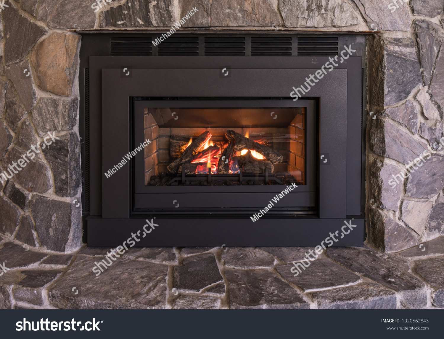 Gas Fireplace Logs Flames Rock Surround Stock Image Download Now