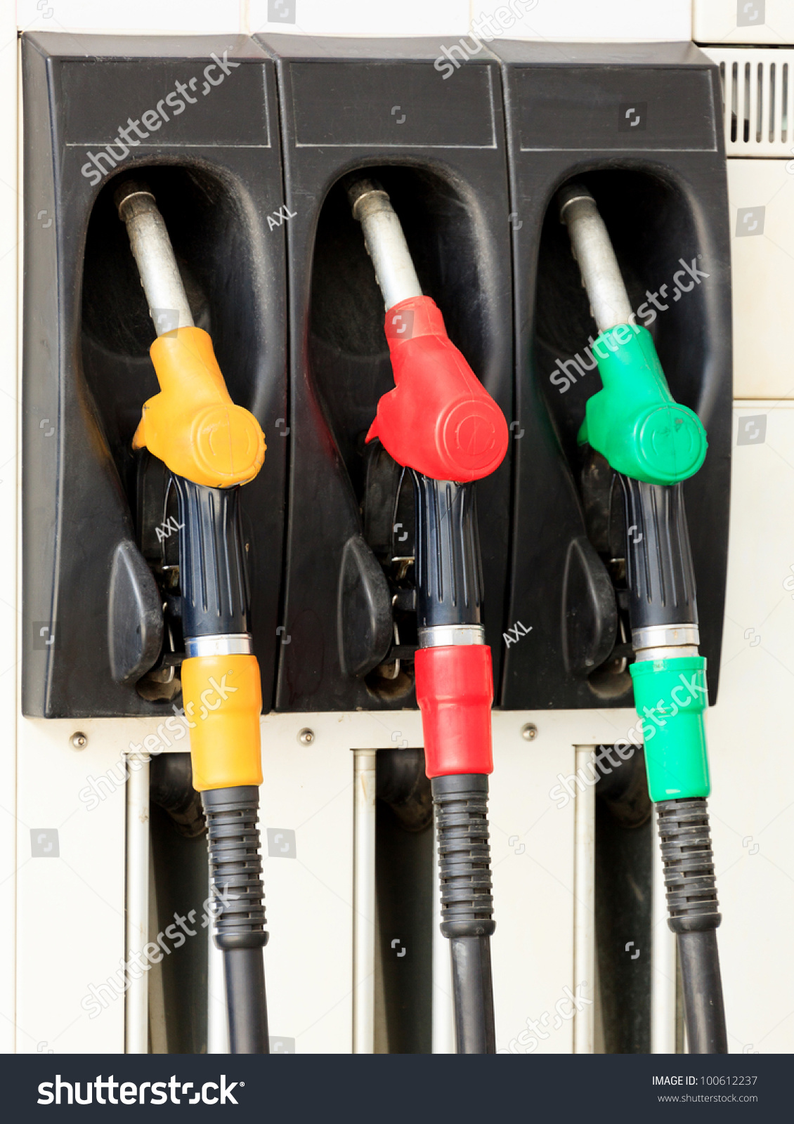 Gas Pump Nozzles In A Service Station Stock Photo 100612237 : Shutterstock