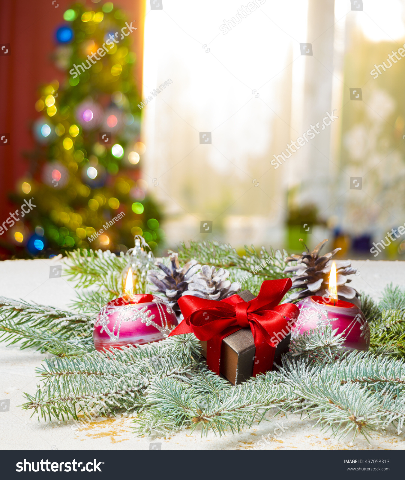 Gift, Christmas Decoration On The Tree Branches On A Background