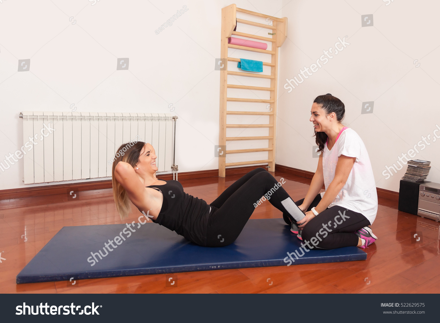 Girl Doing Abs Workout On Gym Stock Photo Edit Now 522629575