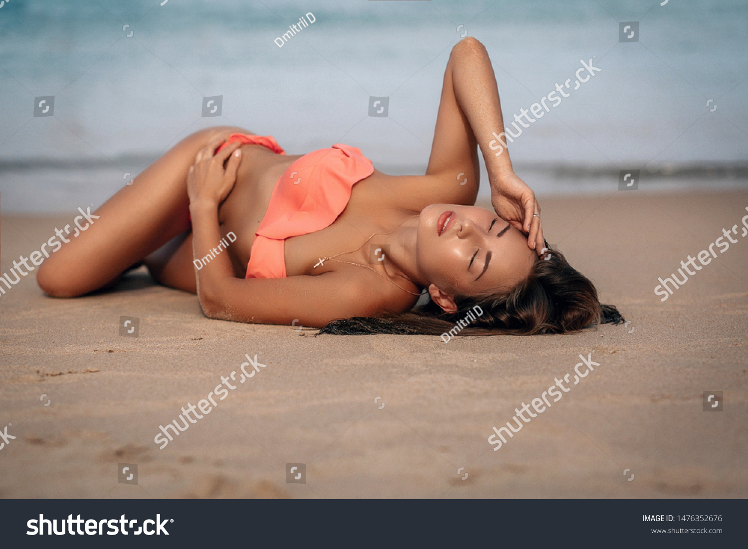 Nude Girl Sun Tanning On Beach