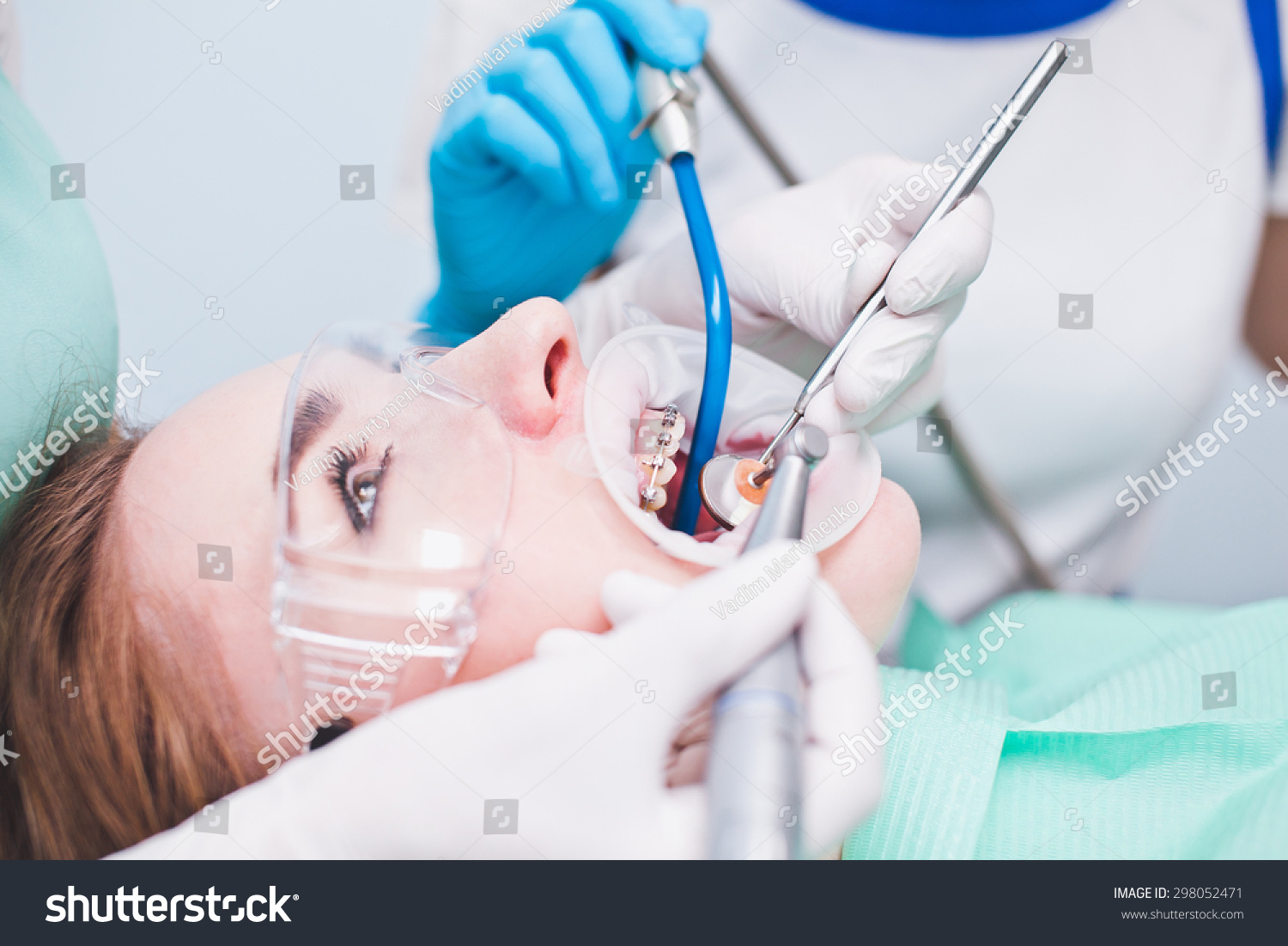 Girl Patient With Protection Glasses With Dental Braces And Mouth ...