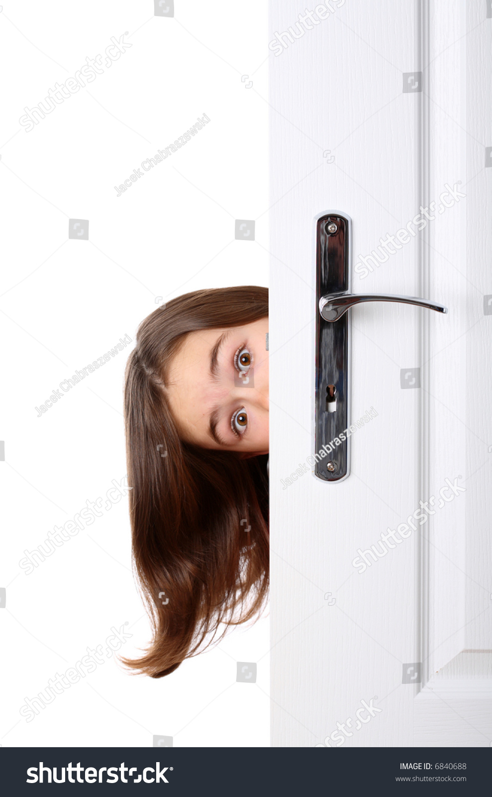 Girl Peeking Behind Door Looking Something Stock Photo (Edit Now) 6840688