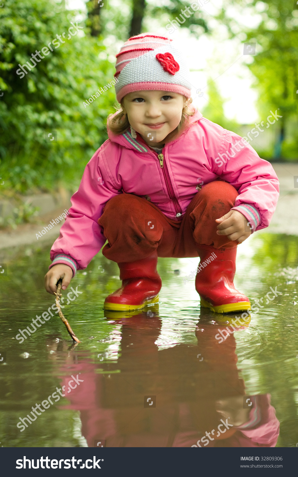 Girl Plays In The Puddle Stock Photo 32809306 : Shutterstock