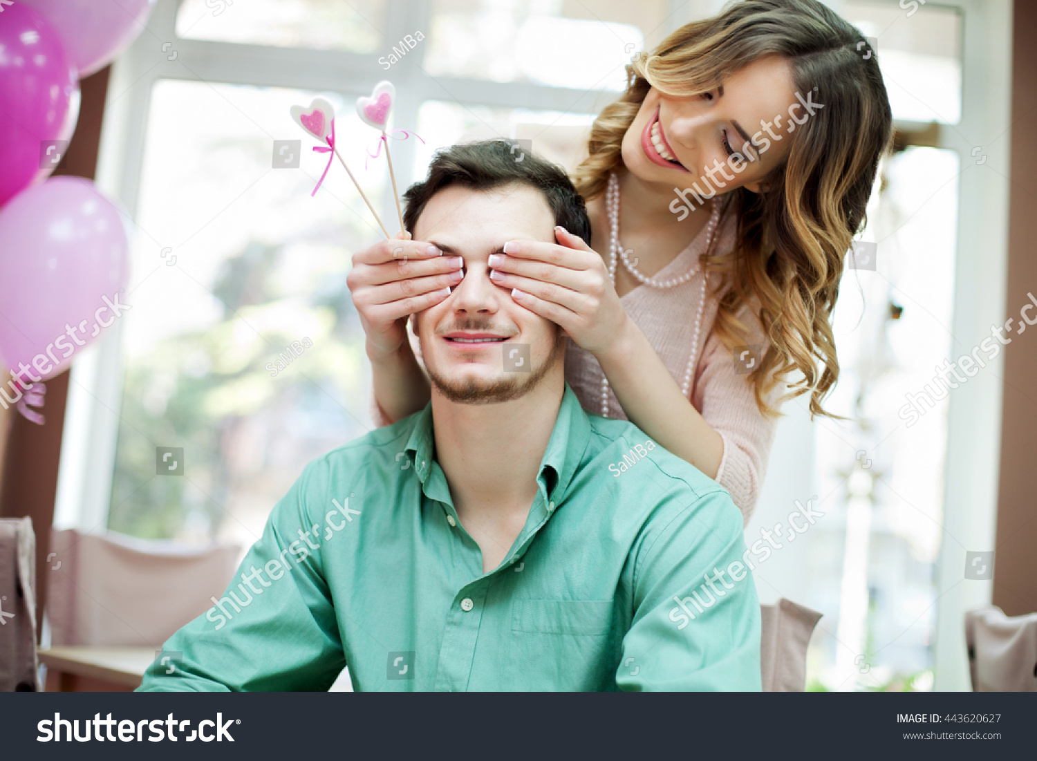 Girl Puts Hands On Boys Eyes Stock Photo Edit Now 443620627